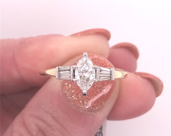 Vintage 14 Karat Yellow Gold Engagement Ring With 4=0.20 CTTW Baguette Diamonds And One 0.54 CT Marquise G SI3 Diamond