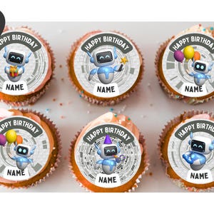 May include: Six round edible cupcake toppers featuring a blue and white robot character. Each topper has a grey circular border with the text "HAPPY BIRTHDAY" at the top and a white rectangular space at the bottom with the word "NAME" printed.