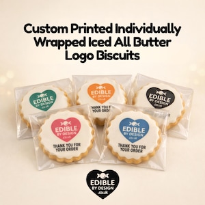 May include: Five round, scalloped-edge iced butter biscuits, each individually wrapped in clear plastic. Each biscuit features a heart-shaped logo with the text "EDIBLE BY DESIGN .co.uk" and "THANK YOU FOR YOUR ORDER" in teal, orange, black, pink, or blue.