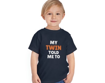 Toddler Funny Twin-Shirt "My Twin Told Me To" | Girl Boy Fun Cute Graphic Print Tee | Brother Sister Matching Shirts Twin Parents Gift Idea