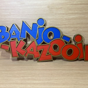 Displaybord Logo Banjo Kazooie in hout - Hangmuur display Man Cave Cartel Madera Wood Nintendo 64 N64 SNES Ultra Nintendo NES-toie