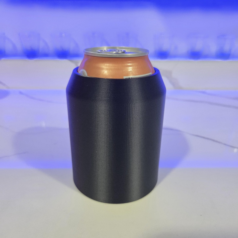 This is a custom design by a professional engineer who loves to party. This Can insulator holds a standard 12 oz can used by MOST beverage brands and a can of the Z brand.  This item is made of Ultra flexible material and is nearly indestructible. The design utilizes a Hollow core to generate ideal thermal dynamic performance to prevent the warmth of your hand from heating up your drink.