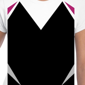 May include: White t-shirt with a black and white geometric design. The design features a large black shape with white and gray accents, and magenta triangles at the shoulders. The shirt has short sleeves.