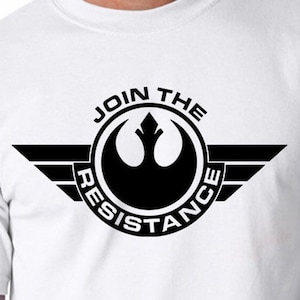 May include: White t-shirt with a black graphic of the Rebel Alliance symbol and the text "Join the Resistance".