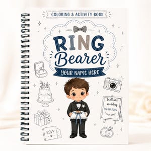 May include: A spiral-bound coloring and activity book with the text "RING BEARER" in blue and gray. The cover features a cartoon illustration of a boy in a tuxedo holding a pillow, along with wedding-themed line drawings.