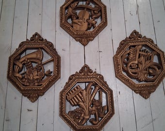 Vintage set of 4 Homco Syroco Musical Instruments Wall Decor Plaques in a gold Hollywood Regency style