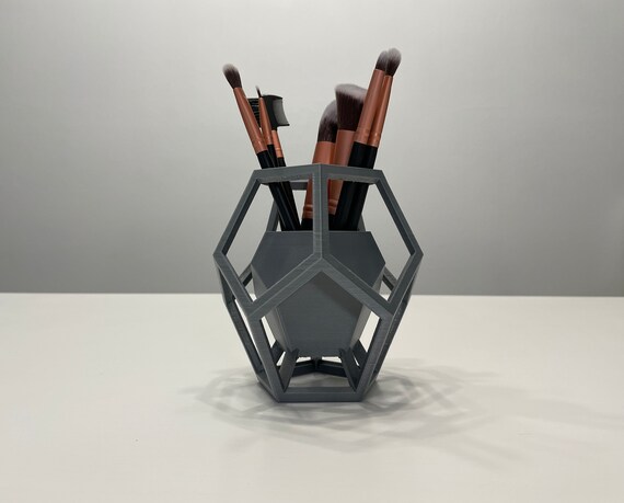 Modern, geometric makeup brush holder