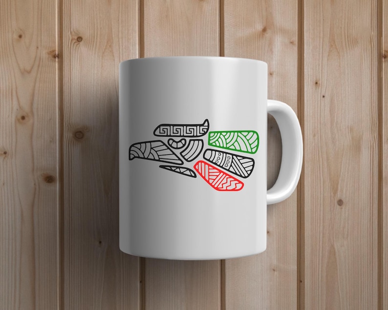 May include: White ceramic mug with a black and white stylized image of an eagle with green, red, and white accents. The eagle is a symbol of Mexico.