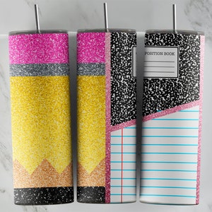May include: Three 20 ounce stainless steel tumblers with different designs. The first tumbler has a pink, gray, and yellow glitter design with a black pencil eraser at the bottom. The second tumbler has a pink, gray, and yellow glitter design with a black and white notebook paper design. The third tumbler has a black and white notebook paper design with the words "Position Book" at the top and a pink and white lined paper design at the bottom.