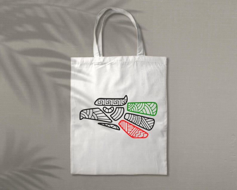 May include: White tote bag with a black and white outline of a stylized eagle with red and green accents. The eagle is a symbol of Mexico.