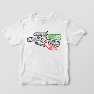 May include: White t-shirt with a black and white outline of a stylized eagle with green and red accents. The eagle is a symbol of Mexico.