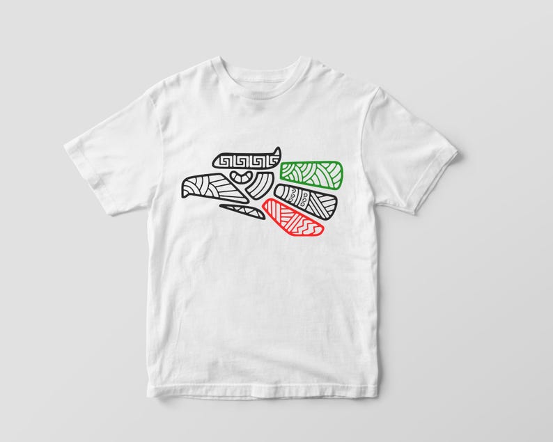 May include: White t-shirt with a black and white outline of a stylized eagle with green and red accents. The eagle is a symbol of Mexico.