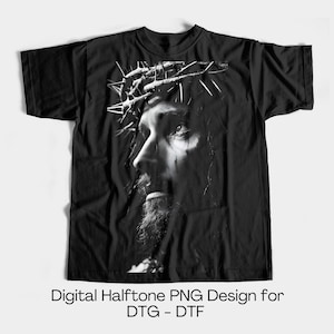 May include: Black and white halftone image of a man with a crown of thorns on a black t-shirt.