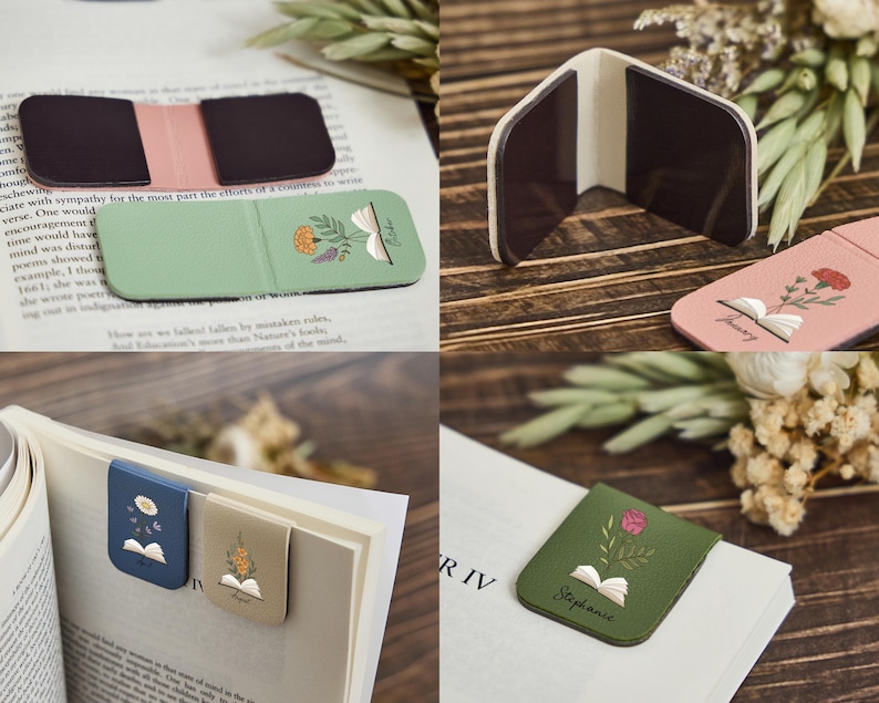 May include: A collection of magnetic bookmarks featuring various solid colors including sage green, dusty pink, navy blue, and olive green. Each bookmark displays a small illustration of an open book with a floral sprig emerging from the pages.