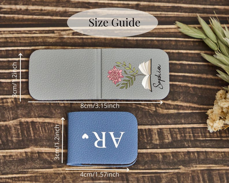 May include: A gray magnetic bookmark featuring a floral book illustration and the name Sophia, measuring 3.15 inches by 1.2 inches, and a blue magnetic bookmark with the letters AR and a heart, measuring 1.57 inches by 1.2 inches.