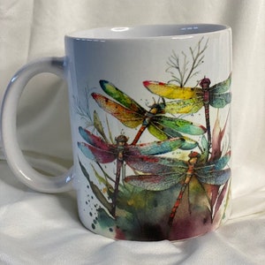 Gorgeous watercolor dragonfly 11 oz coffee mugs.  Six designs to choose from!