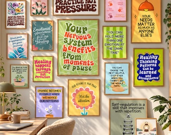 May include: A gallery wall featuring fifteen framed posters with various mental health affirmations and colourful graphic illustrations. The prints display motivational text in diverse fonts and styles, arranged in a grid pattern on a light wall.
