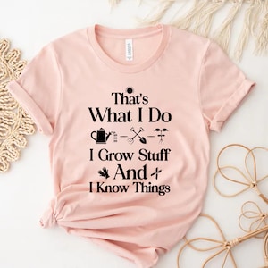 May include: A pink t-shirt with a black graphic that says "That's What I Do - I Grow Stuff And I Know Things" with gardening icons.