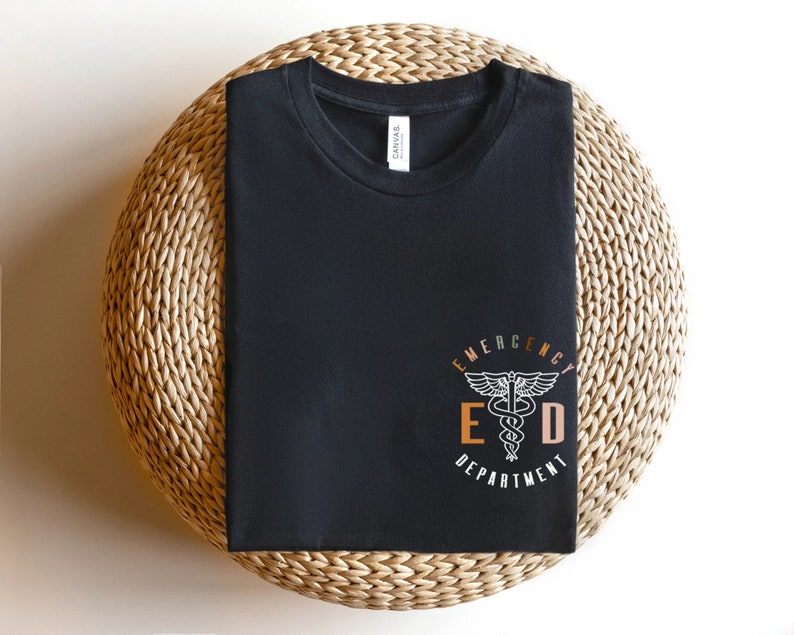 May include: Black t-shirt with a white graphic of a medical symbol and the text "Emergency Department" in a circle.