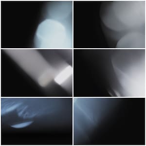 May include: A collection of six abstract images featuring various light effects and lens flares. The images are in shades of gray and white on a black background.
