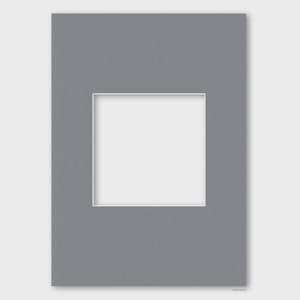 May include: A gray mat with a white rectangular opening in the center.