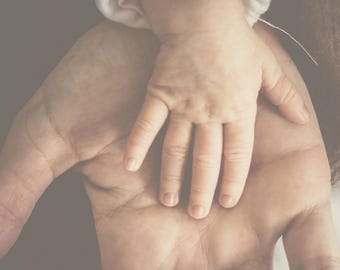 May include: Image promoting inner child reconnection. The image shows a baby's hand resting on an adult's palm. Text at the top reads "INNER CHILD RECONNECTION" and "7-Day Healing Journey to Emotional Restoration, Joy, and Wholeness."