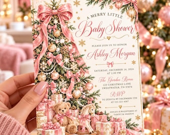 May include: A rectangular baby shower invitation card featuring a decorated Christmas tree with pink bows, gold ornaments, and snowflakes. Below the tree are wrapped gifts, a teddy bear, and a rocking horse. Text includes A MERRY LITTLE Baby Shower.