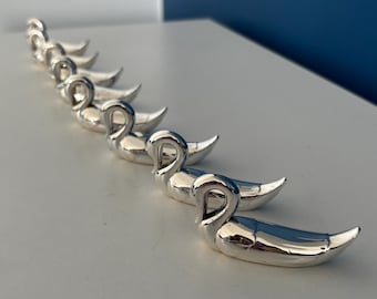 set of vintage silver metal knife rests - elegant swan shape