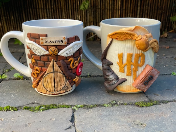 Mugs decorated with polymer clay