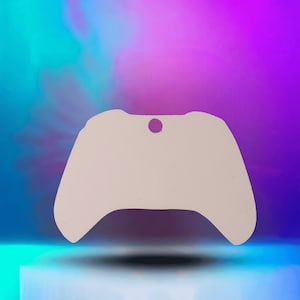 May include: A white plastic blank video game controller keychain with a hole for a keyring. The controller is a generic design with no specific brand or buttons.