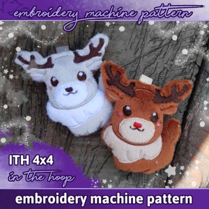 May include: Two plush reindeer ornaments, one white and one brown, with embroidered details. The ornaments are on a wooden background with a purple and white overlay that says "ITH 4x4 in the hoop embroidery machine pattern".