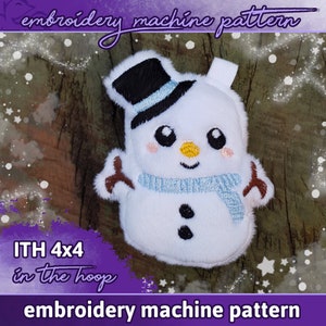 May include: Embroidered snowman plush toy pattern for a 4x4 inch embroidery hoop. The snowman is white with a black top hat, blue scarf, and black eyes and buttons. The pattern is for an in-the-hoop project.