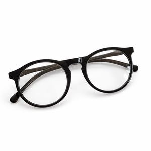 May include: Black round-frame eyeglasses featuring clear lenses and dark brown wood-textured temples. The frames have a glossy finish, a thin bridge, and curved earpieces. The design includes a classic circular shape with a solid black front.