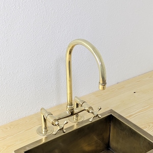 Handmade Unlacquered Brass Bridge Kitchen Faucet: Swivel Spout