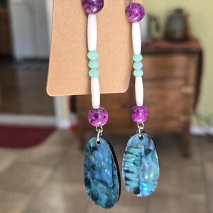 Dangle earrings.