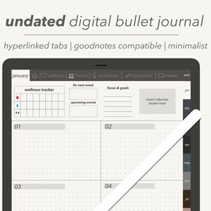 May include: A digital bullet journal app on a tablet screen. The app features a calendar view with a monthly layout, a wellness tracker, and a focus and goals section. The app is available in landscape and portrait mode.