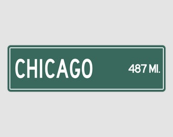 Puede incluir: Señal de carretera verde con texto blanco que dice "CHICAGO 487 MI."