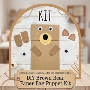 Könnte beinhalten: Ein DIY-Bastelset für eine Braunbär-Papiertüten-Handpuppe mit einer braunen Papiertüte, zwei Wackelaugen, einer gelben Schnauze mit schwarzer Nase, zwei braunen Ohren und zwei braunen Pfoten. Der Text KIT und DIY Brown Bear Paper Bag Puppet Kit ist sichtbar.