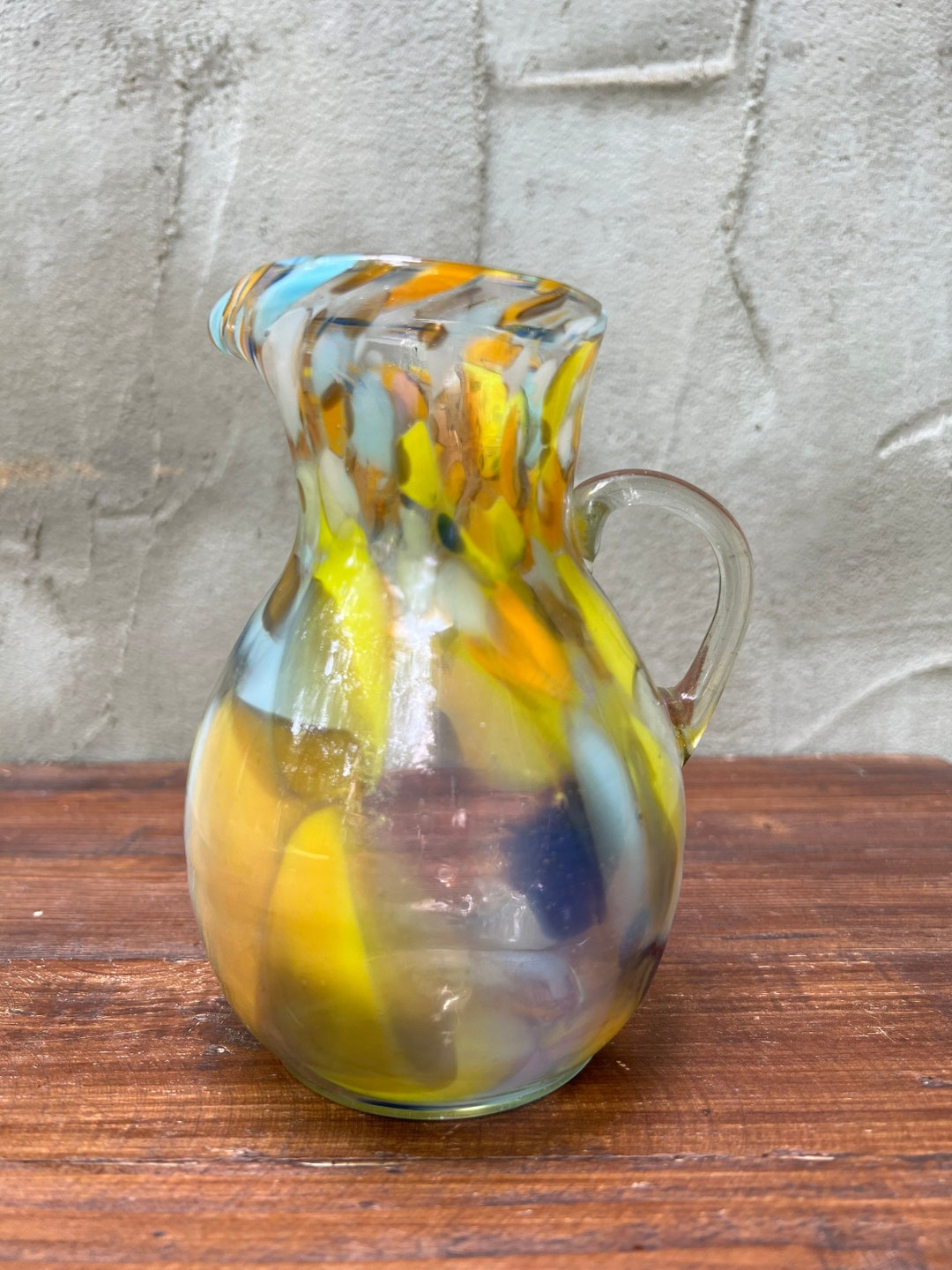 Small Hand Blown Glass Pitcher With Yellow, Blue, Orange, White Swirled ...