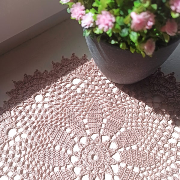 Handmade coffee lace crochet doily.