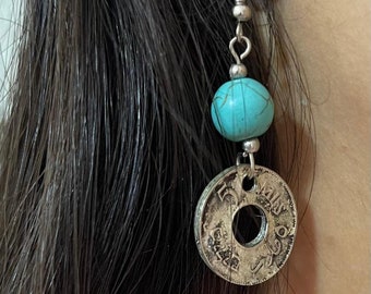 Handmade earring from a very old palestinian coin with circles of natural stones