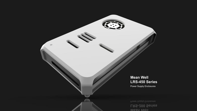 Op de afbeelding: Een witte behuizing voor een voeding met een ventilator, ventilatieopeningen en de tekst "Mean Well LRS-450 Series Power Supply Enclosures". Het rechthoekige apparaat heeft een afgerond randontwerp.