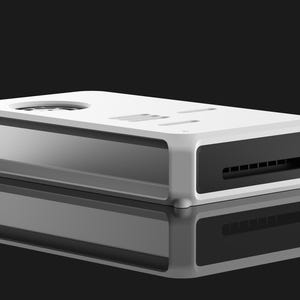May include: A white rectangular electronic device with a black vent and a circular opening on top. The device has a reflective surface below it, creating a mirrored effect. The background is black.