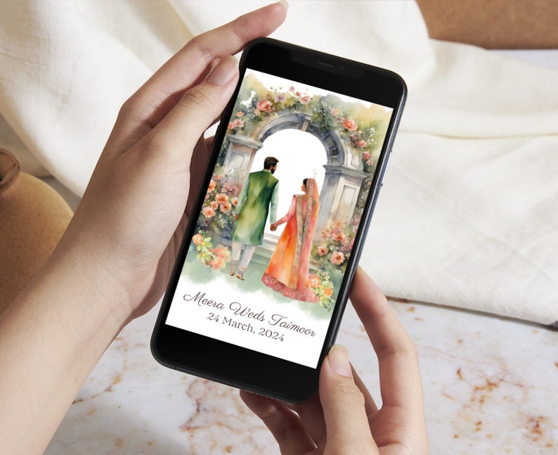 May include: A digital wedding invitation on a smartphone screen. The invitation features a watercolor illustration of a couple walking under a floral archway. The text reads "Meera Weds Taimoor 24 March, 2024".