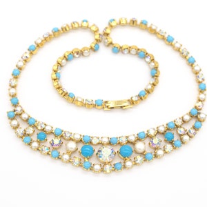 Captivating Vintage Gold Tone Choker Necklace with Faux Turquoise, Aurora Borealis Crystal, and Faux Pearl from the Retro 60s
