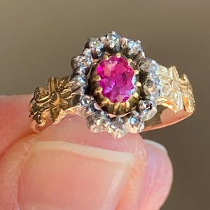 Early Victorian Pink Sapphire/Ruby Ring with Diamond Cluster Halo and Detailed Shank
