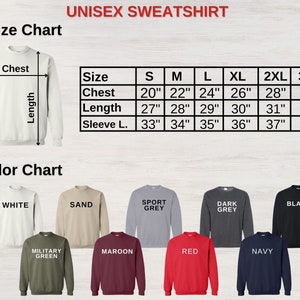 May include: Unisex sweatshirt size chart with measurements in inches for chest, length, and sleeve length. Color chart shows 10 different colors: white, sand, sport grey, dark grey, black, military green, maroon, red, navy.