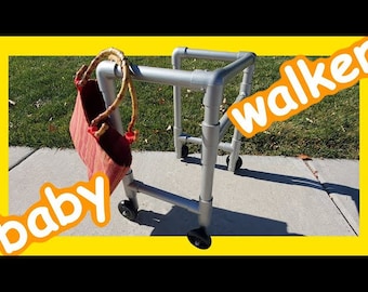 May include: A silver PVC pipe walker with wheels, designed for a baby. The walker has a red and white striped bag hanging from it. The words "baby walker" are written in orange letters on a yellow background.