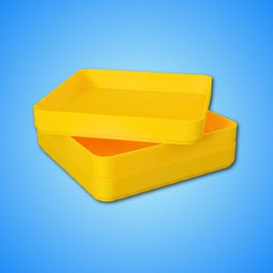 May include: Two bright yellow rectangular containers, one stacked on top of the other, against a gradient blue background. The top container is slightly smaller and sits atop the larger one, revealing an orange interior.