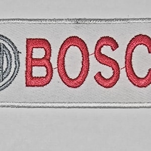 May include: White embroidered patch with a gray circle containing a stylized letter H and the word "BOSCH" in red lettering.